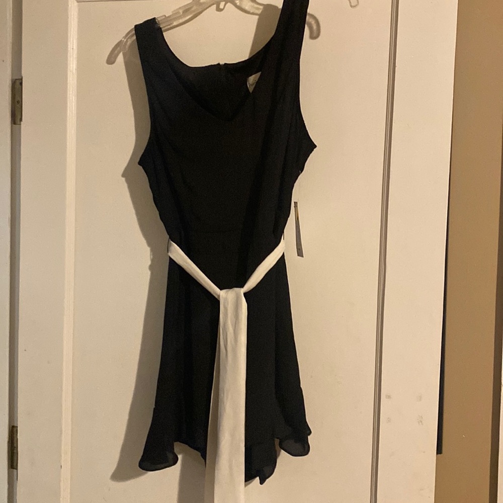Black romper with tags